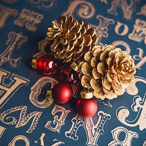 christmas ornaments on wrapping paper