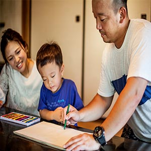 Parents helping child with homework