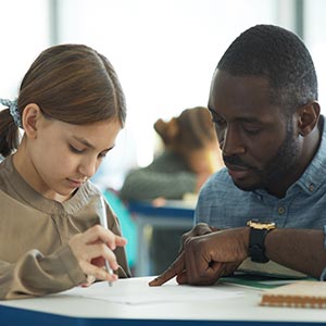 tutor helping child